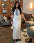 White Womens Dress - Elegant Knitted Denim Summer Dress with Gold Buttons, Figure-Hugging Fit and Flared Bottom