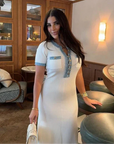 White Womens Dress - Elegant Knitted Denim Summer Dress with Gold Buttons, Figure-Hugging Fit and Flared Bottom